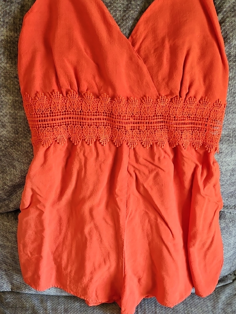 Source Unknown Orange romper.